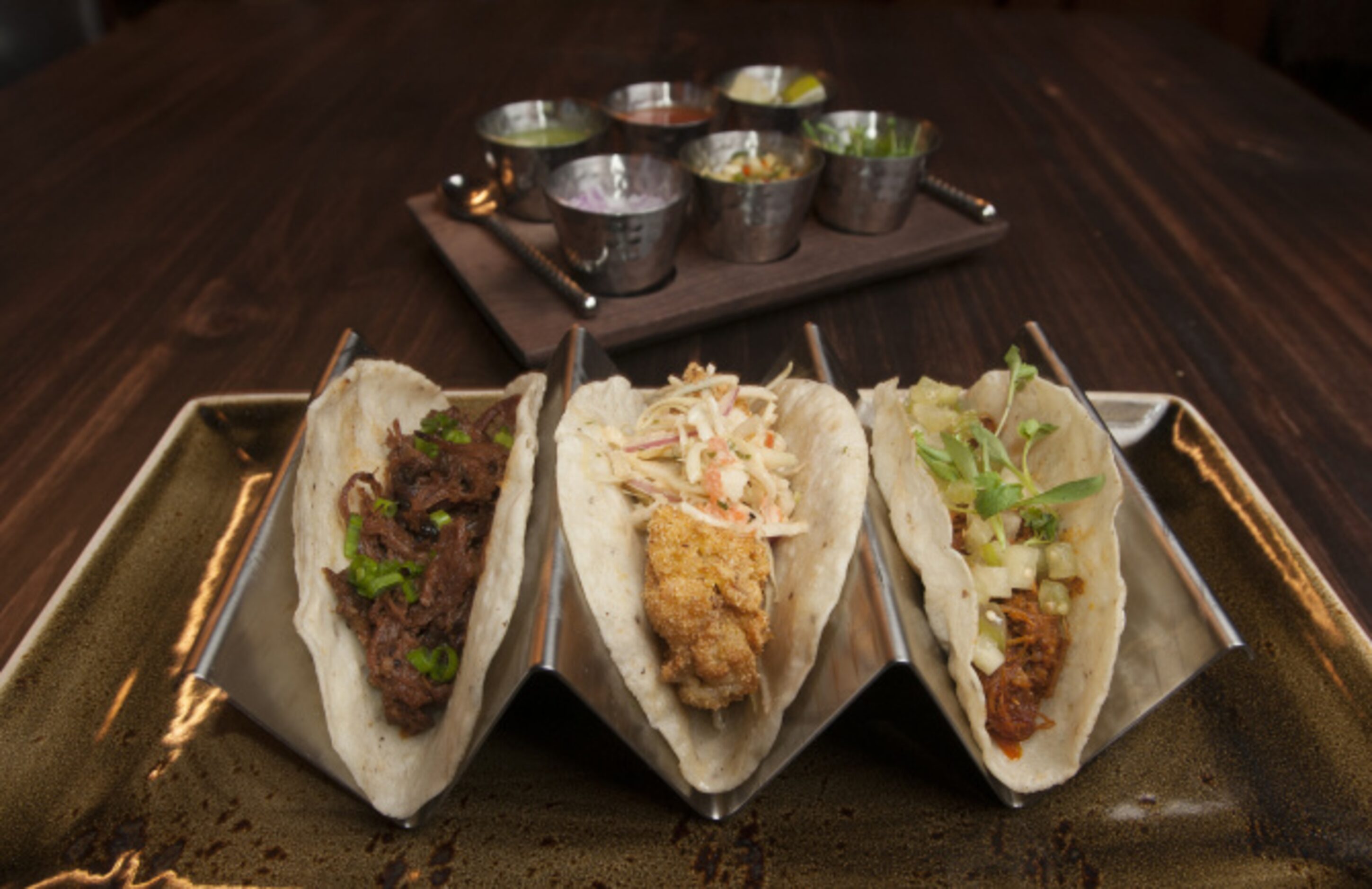 STAMPEDE 66: Tacos at Stampede 66, with hand-made corn tortillas fashioned from masa made...