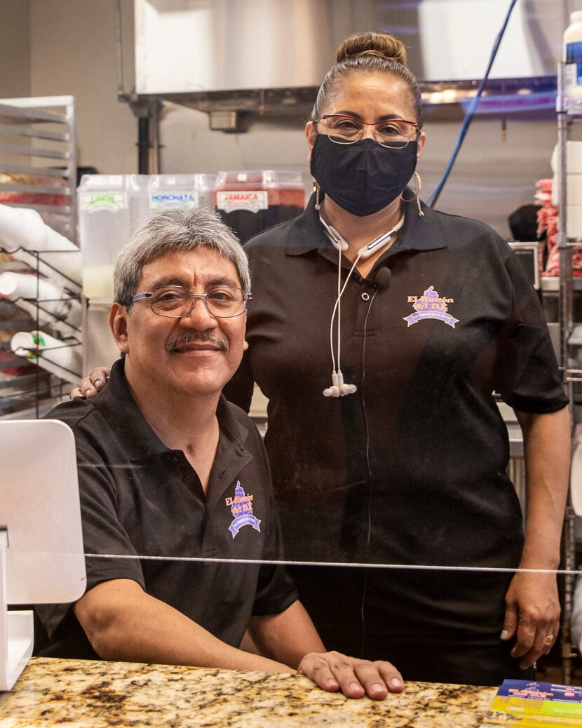 Owners and husband-and-wife duo Martín Ramirez and Gloria Chamorro pose for a portrait...