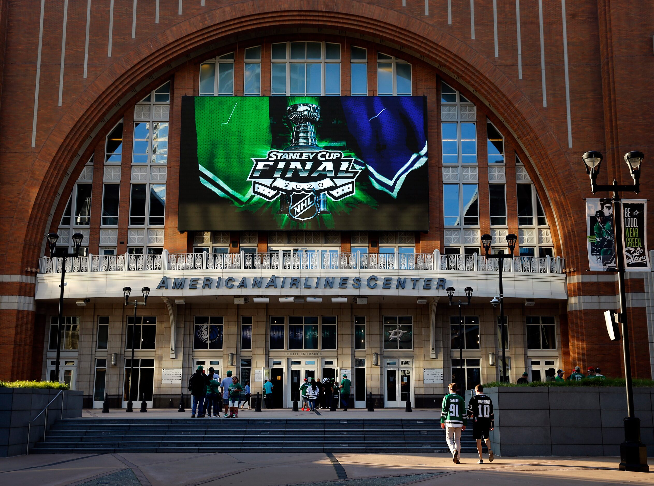 Dallas Stars fans arrive for a Stanley Cup Finals watch party at the American Airlines...