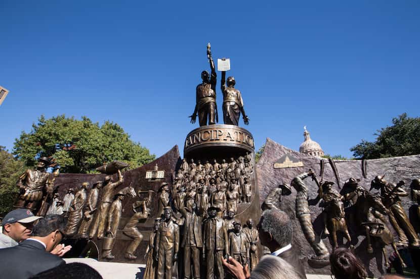 The African American Memorial Statue is unveiled outside the Texas State Capitol in Austin,...