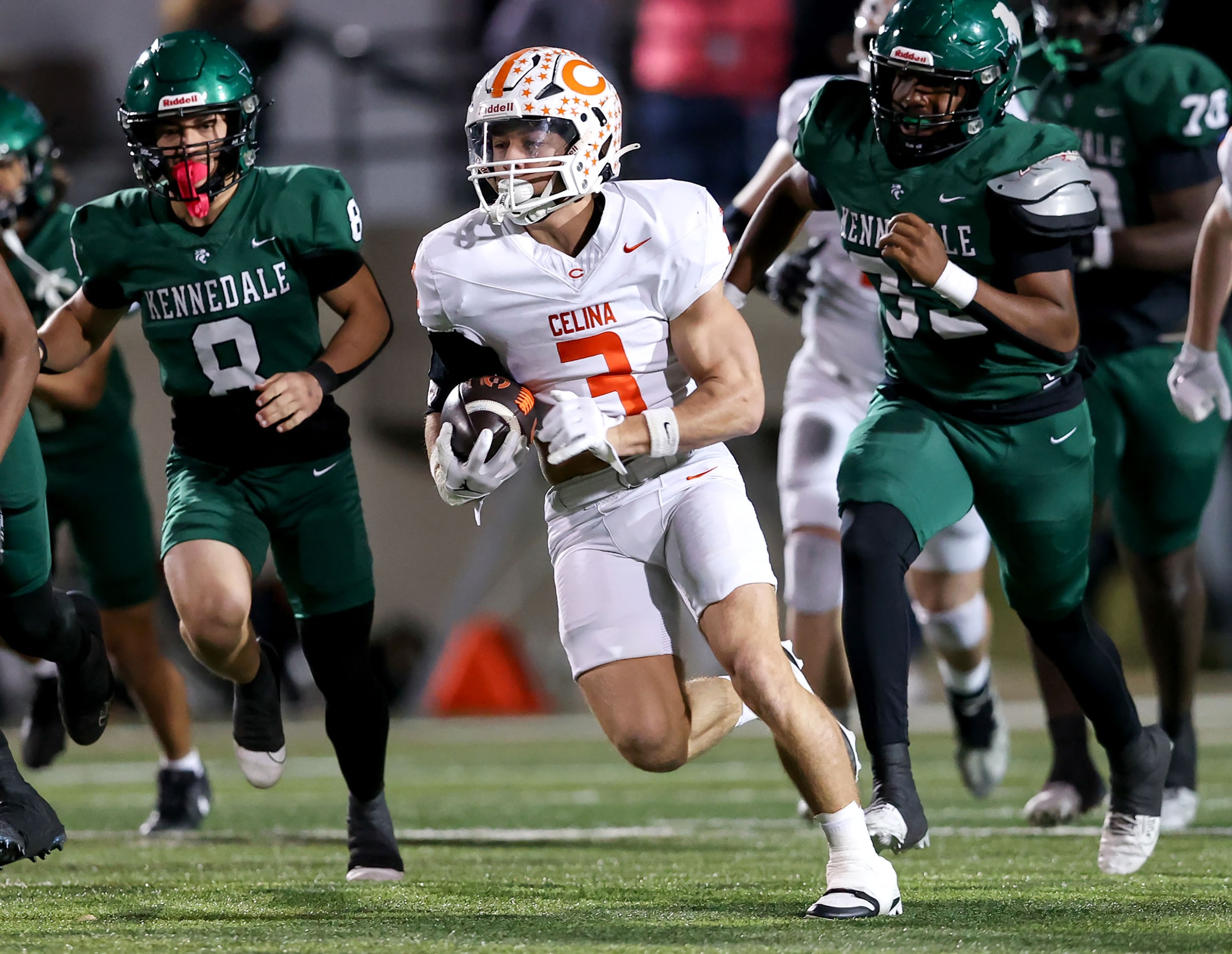 Celina running back Logan Gutierrez (3) finds a huge hole to run against Kennedale during...