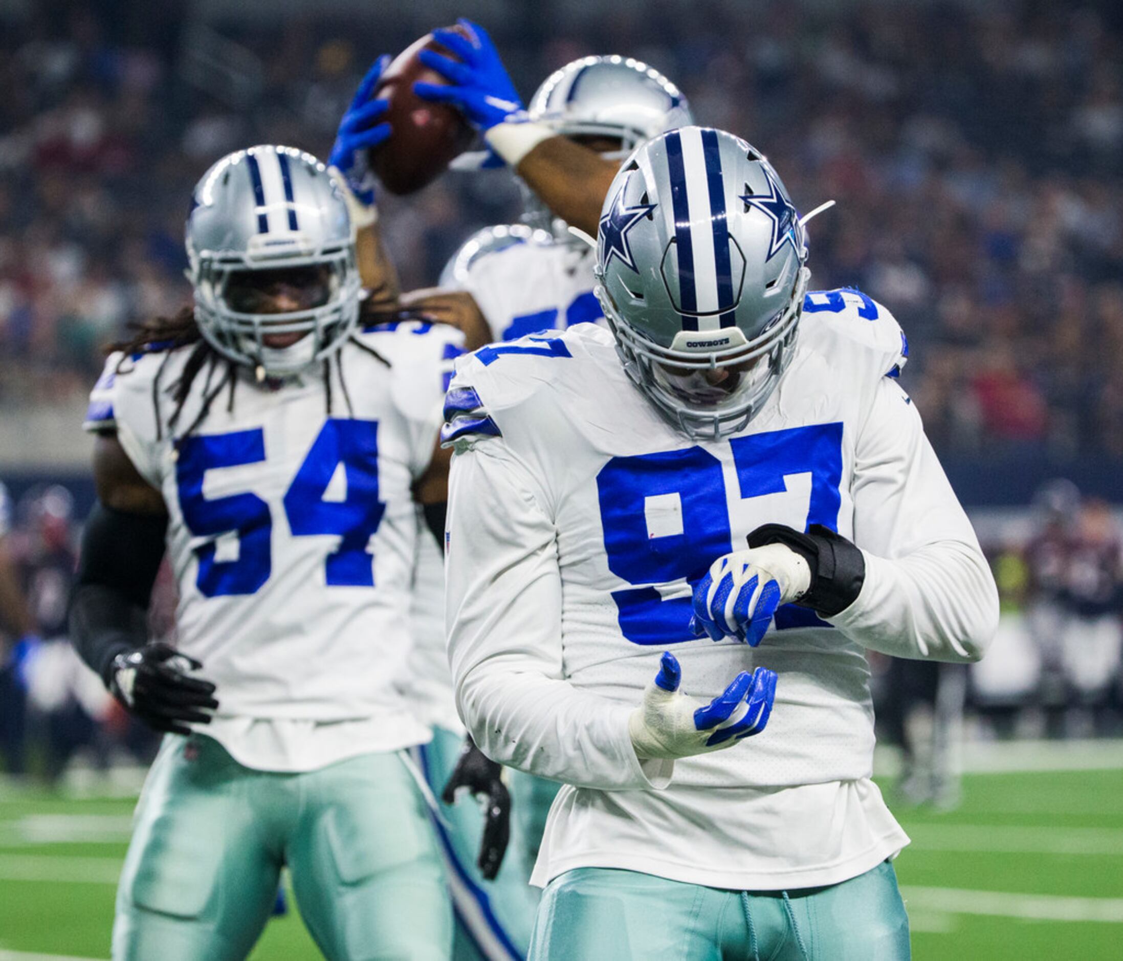 Dallas Cowboys defensive end Taco Charlton (97) walks off the