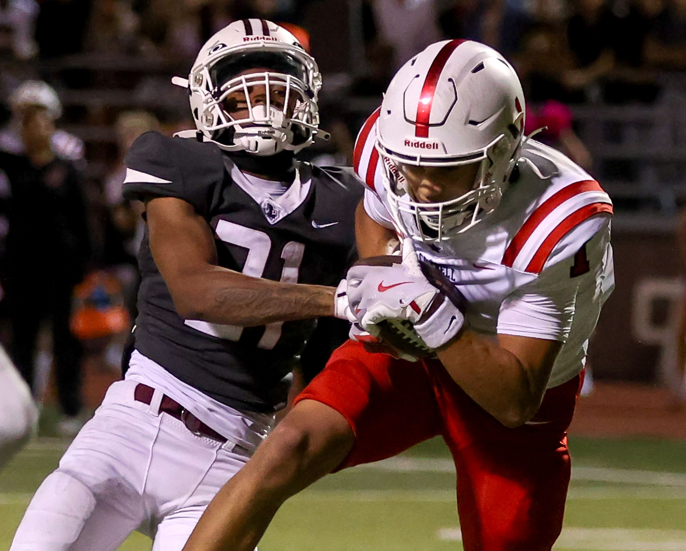 Coppell wide receiver Tucker Cusano (1) comes up with a 20 yard touchdown reception against...