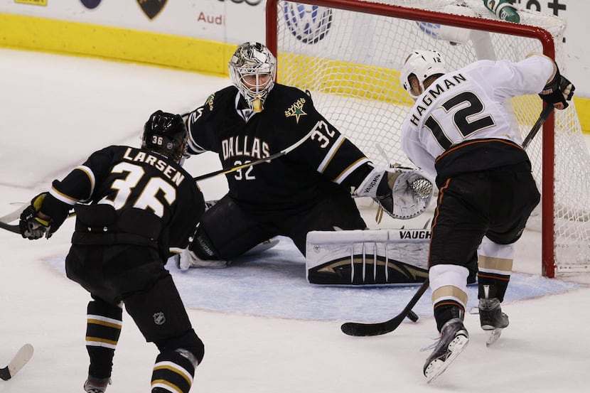 DALLAS, TX - MARCH 10: Niklas Hagman #12 of the Anaheim Ducks attempts to control a rebound...