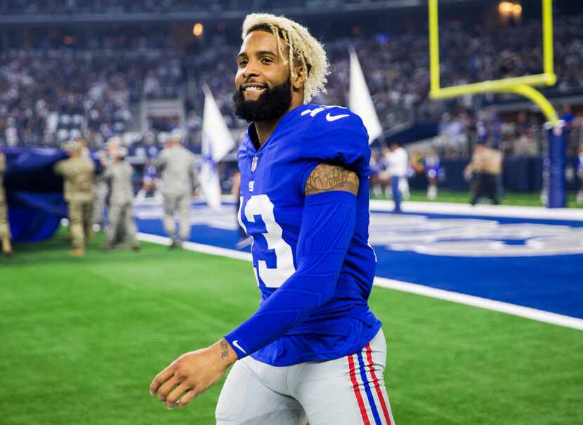 New York Giants wide receiver Odell Beckham (13) walks on the sideline before an NFL game...