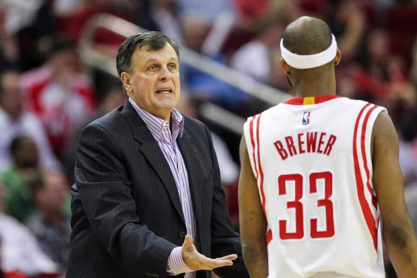 Apr 15, 2015; Houston, TX, USA; Houston Rockets head coach Kevin McHale talks with guard...