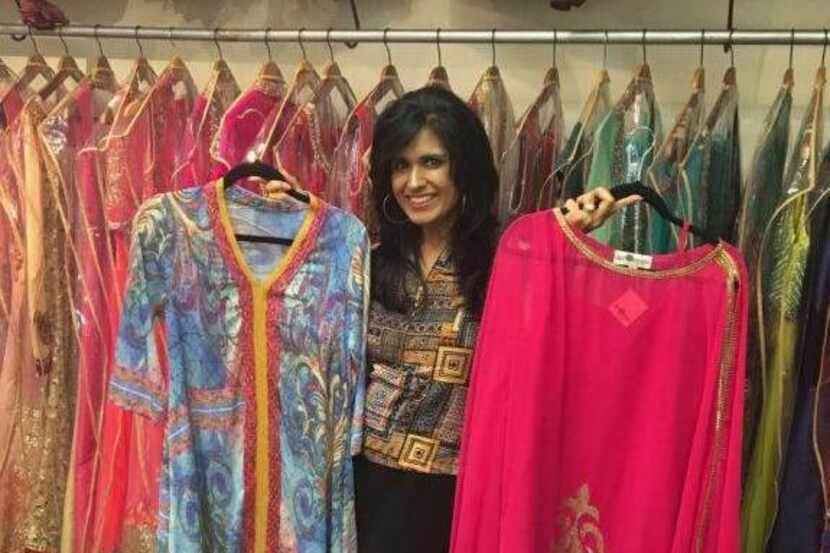 Ruby Bhandari with some of the clothing she designs for her Dallas-based company Silk Threads.