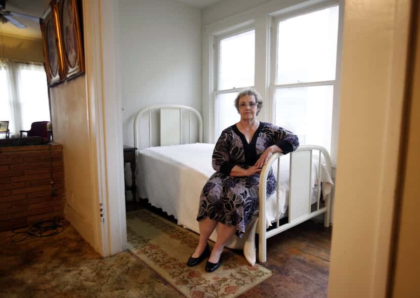 Patricia Puckett Hall poses for a photo inside the small room in her house on North Beckley...