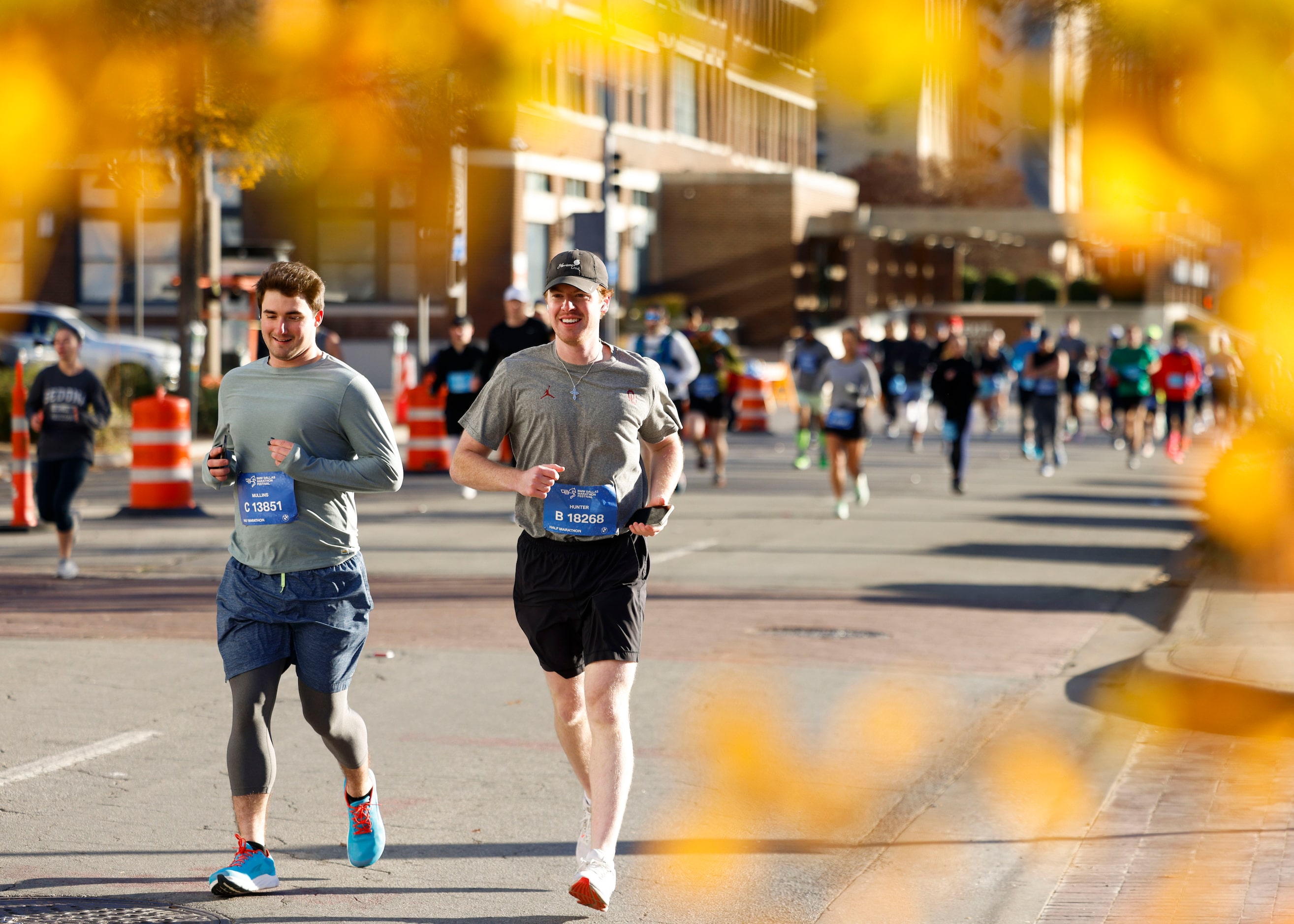 Runners goes along Young St. during 2023 BMW Dallas Marathon on, Sunday, Dec. 10, 2023, in...