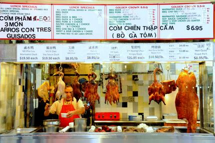 Golden Crown B.B.Q. sells marinated duck, chicken and pork inside Hong Kong Market.