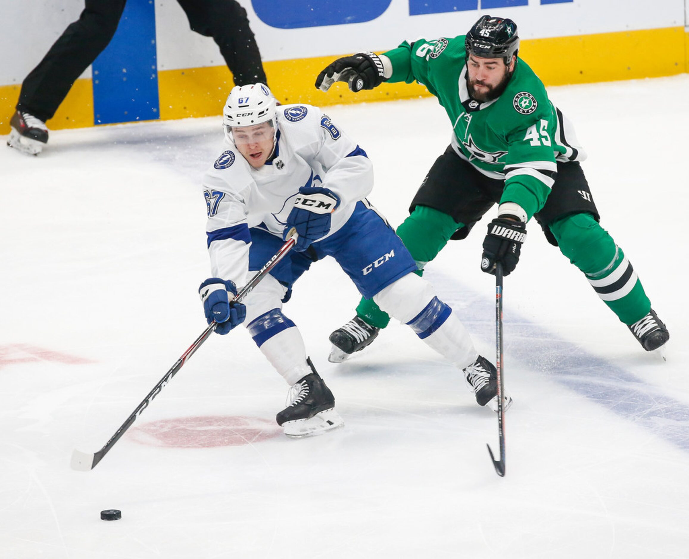 Tampa Bay Lightning center Mitchell Stephens (67) and Dallas Stars defenseman Roman Polak...