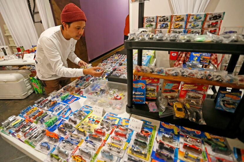 Patrick Estrella takes a close look at model cars during North Dallas Toy Show at Dallas...