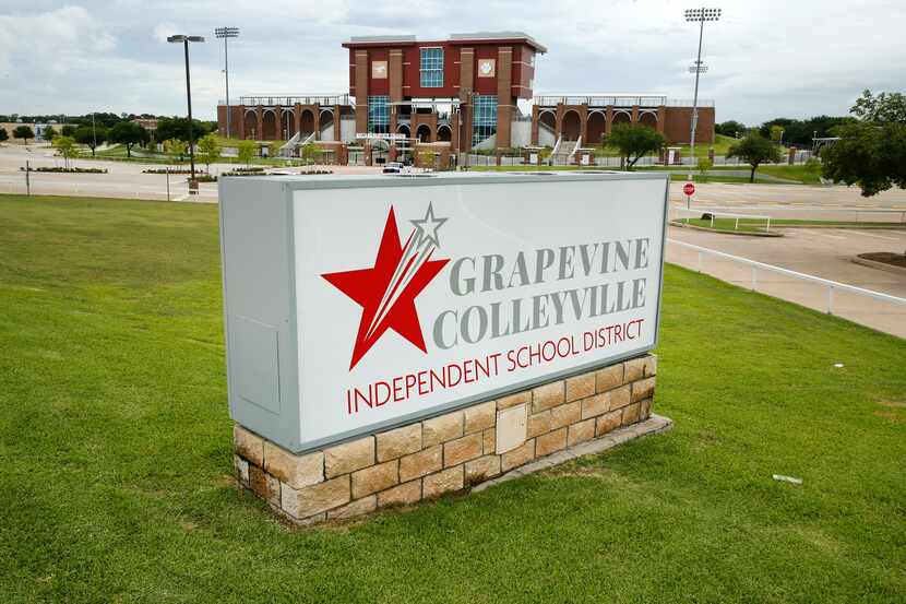 The Grapevine-Colleyville  ISD sign is pictured before Mustang Panther Stadium in Grapevine,...