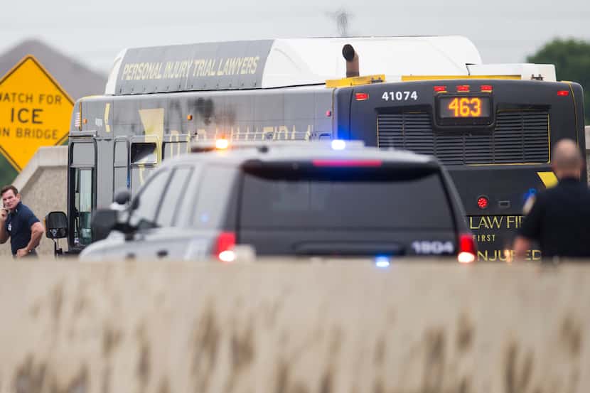 A DART bus is investigated after a gunman held the driver hostage and fired shots inside the...