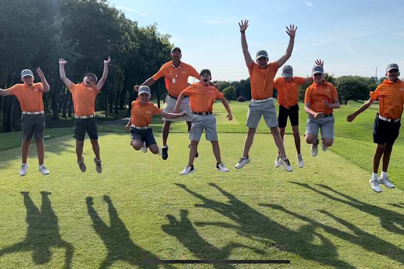 The Brookhaven Blue 13U All-Stars jump for joy after winning the regional competition to...