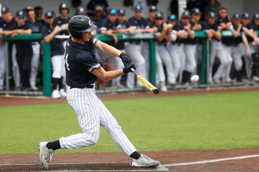 Denton Guyer’s Brad Pruett hits during the third inning of a baseball game against Byron...