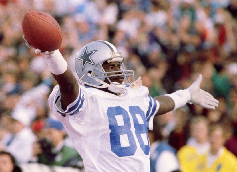 Cowboy Michael Irvin celebrates a touchdown after catching a 19-yard Aikman pass in the 2nd...
