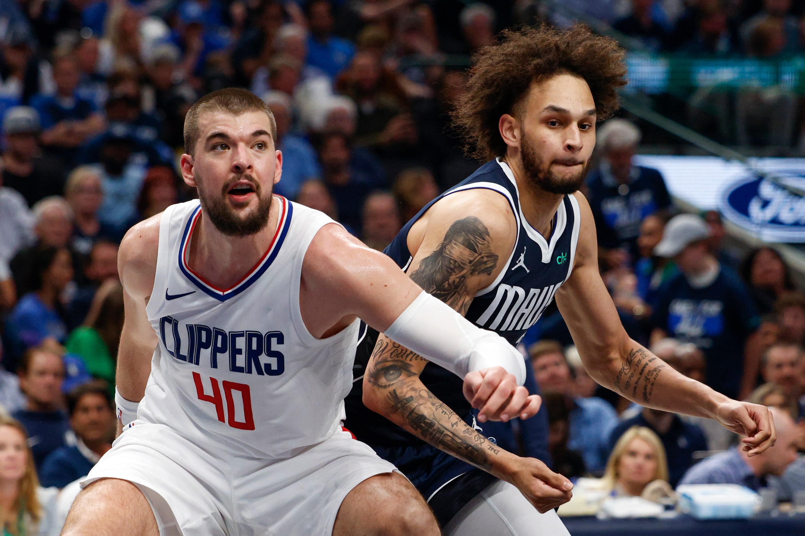 LA Clippers center Ivica Zubac (40) boxes out Dallas Mavericks center Dereck Lively II (2)...