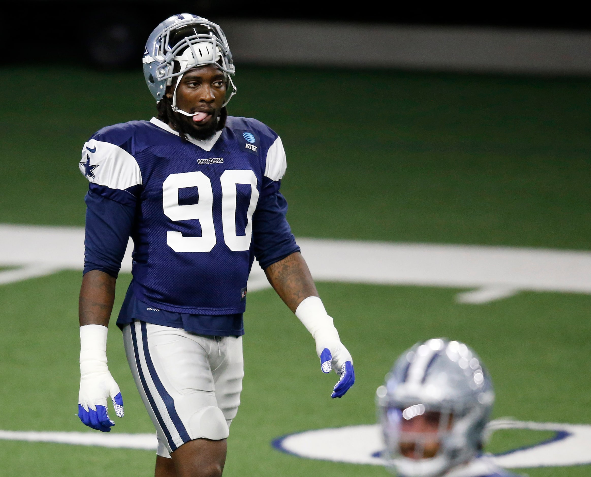 Dallas Cowboys defensive end DeMarcus Lawrence (90) makes his way up the field during...