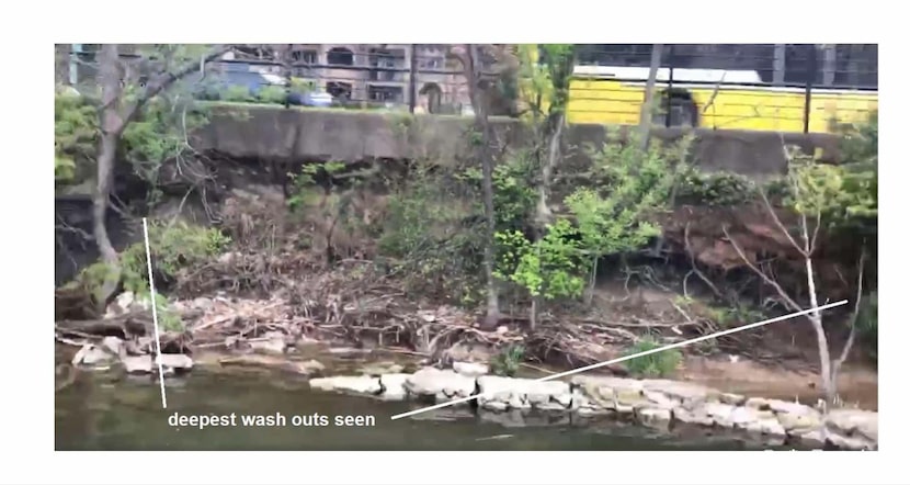 An image taken on the water shows erosion beneath White Rock Trail along Garland Road in...