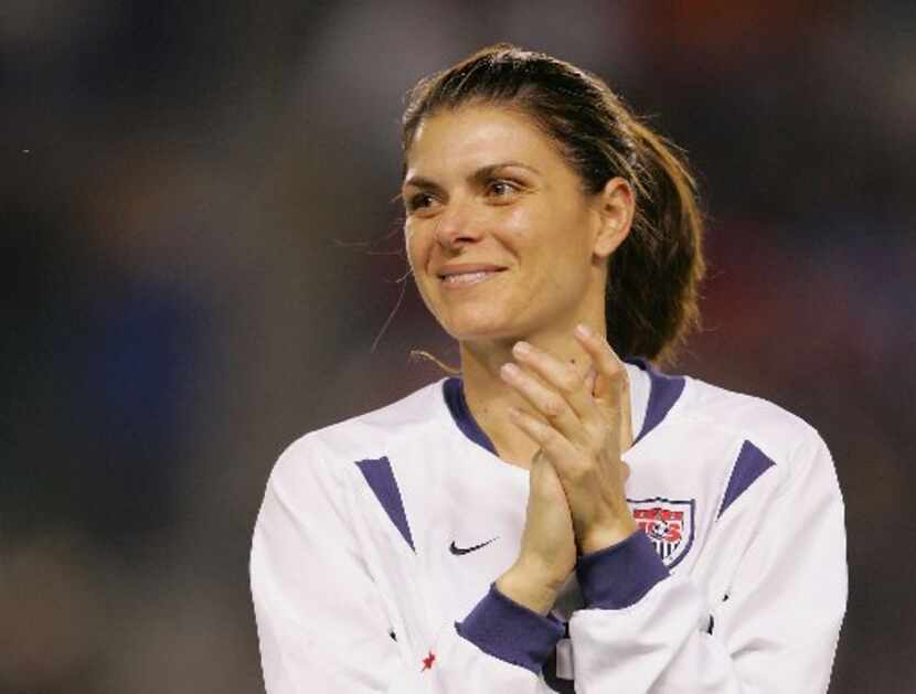 Let's take it back now, y'all. Here's soccer player Mia Hamm in 2004.