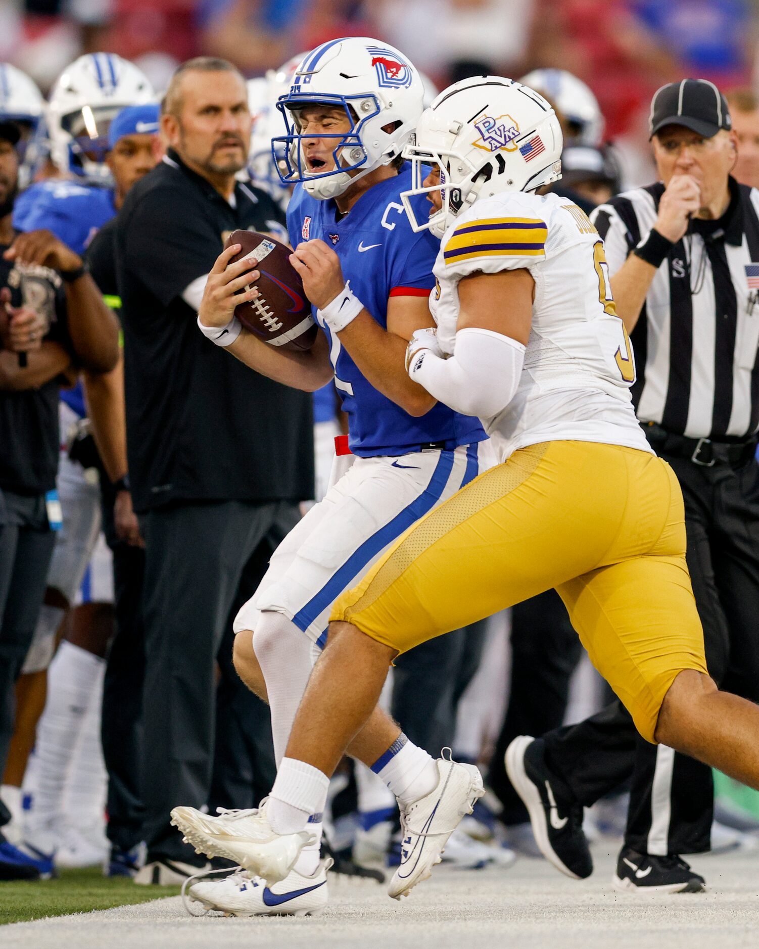 Prairie View A&M linebacker Keyshawn Johnson (9) hits SMU quarterback Preston Stone (2) late...