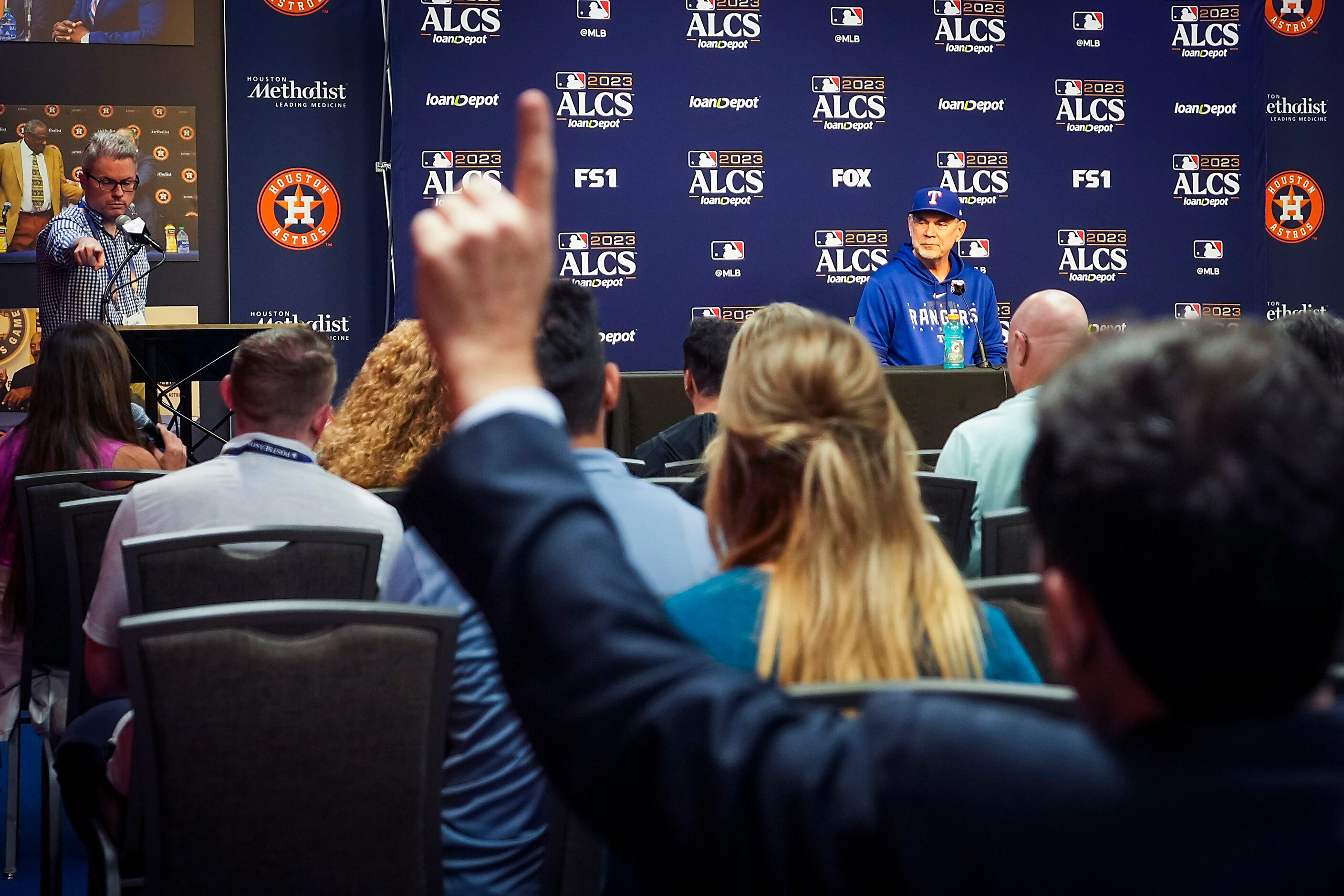 Texas Rangers manager Bruce Bochy addresses reporters prior to a workout in preparation for...