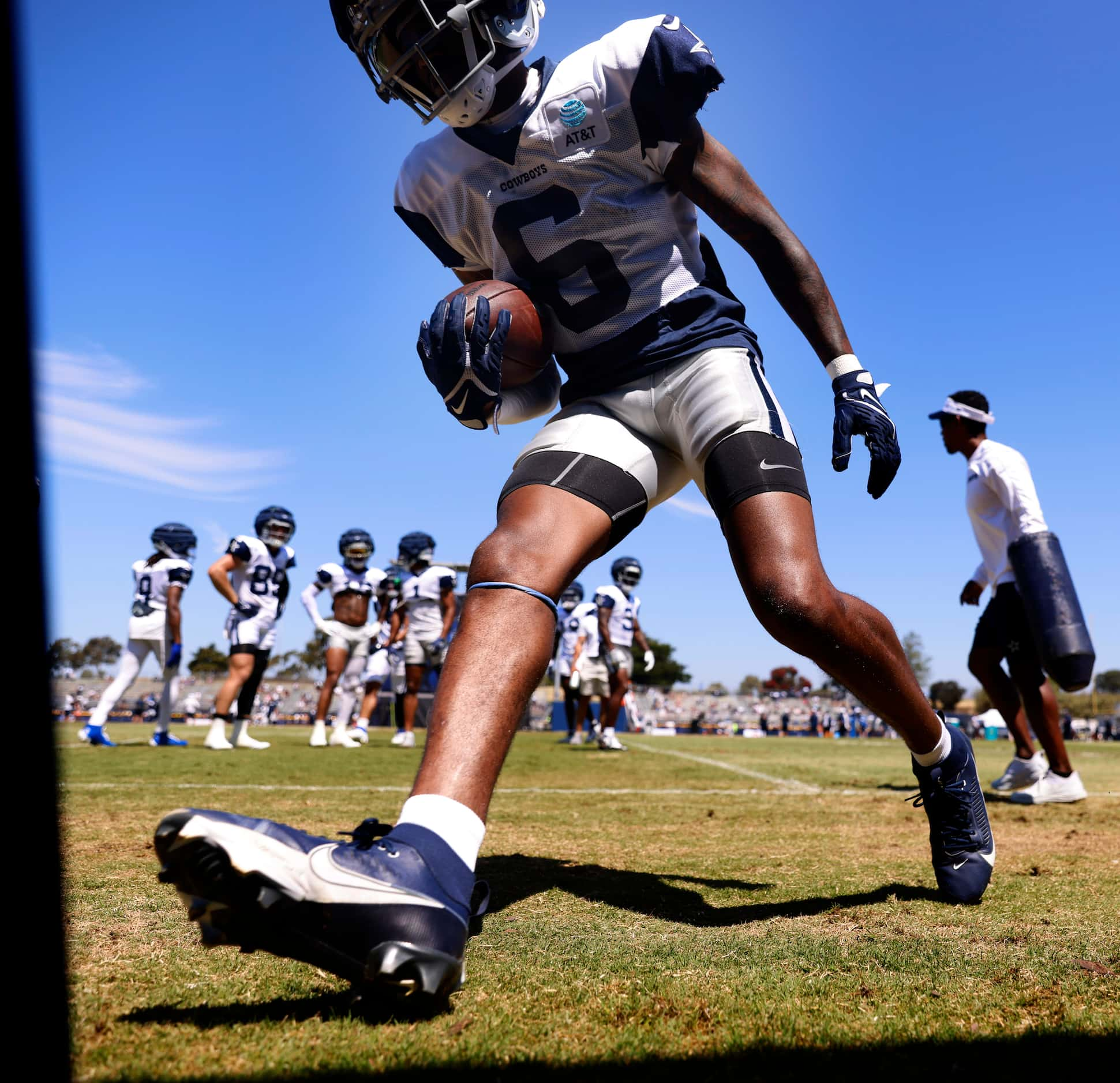 Dallas Cowboys safety Donovan Wilson (6) pulled down a catch along the sideline as he was...