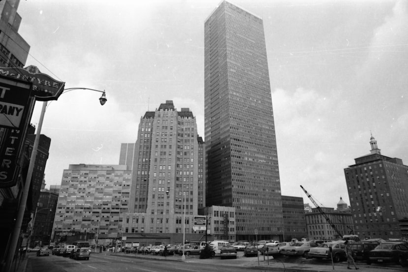 The Medical Arts Building, dwarfed by the Republic Bank Center, as demolition of the former...