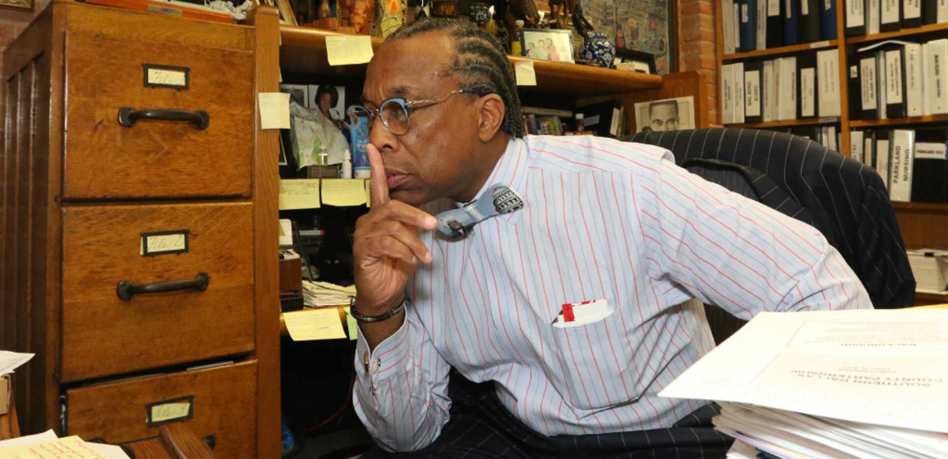 Dallas County Commissioner John Wiley Price works in his office on Saturday, April 29, 20017...