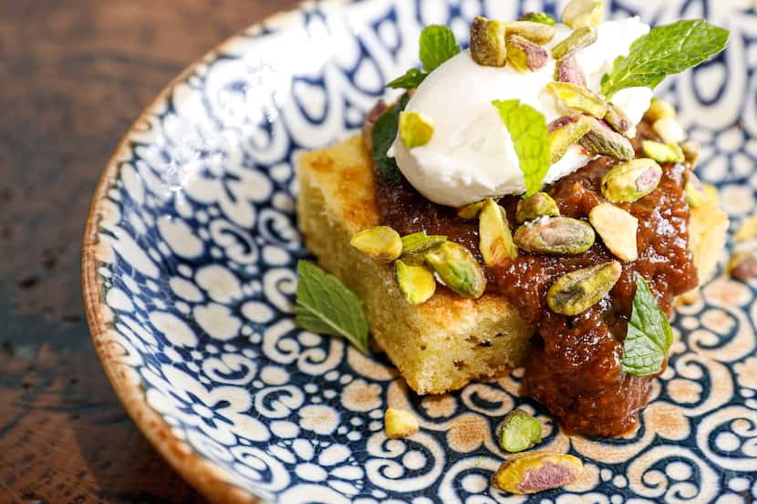 Anise restaurant’s dessert, olive oil cake with fig jam, whipped mascarpone, pistachios and...