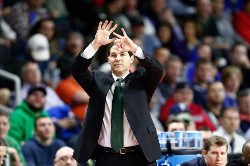 Mar 17, 2016; Providence, RI, USA; Baylor Bears coach Scott Drew reacts during the first...