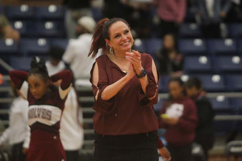 Mansfield Timberview head coach Kit Kyle-Martin beams as she acknowledges applause from fans...