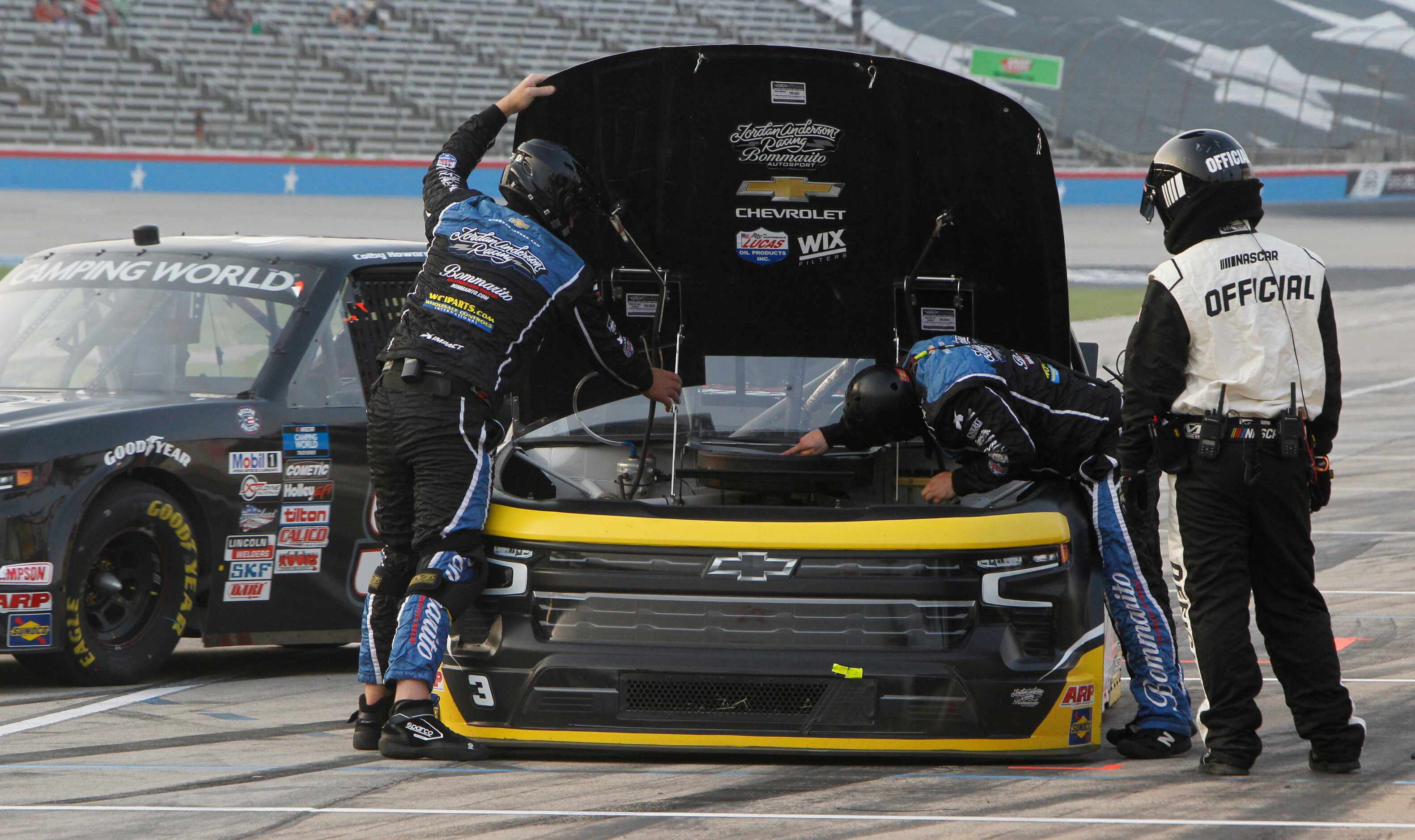 Pit crew members work to get driver Jordan Anderson in the #3 Dometic Outdoor Chevrolet car...