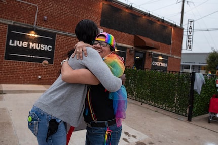 Krista De La Rosa, left, greets Tiffany Algarin as she arrives to a protest outside of...