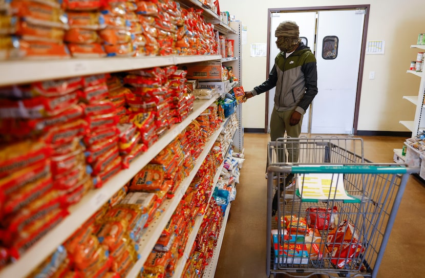 Frisco resident Pete Sanders grabs some ramen noodles while shopping at Frisco Family...