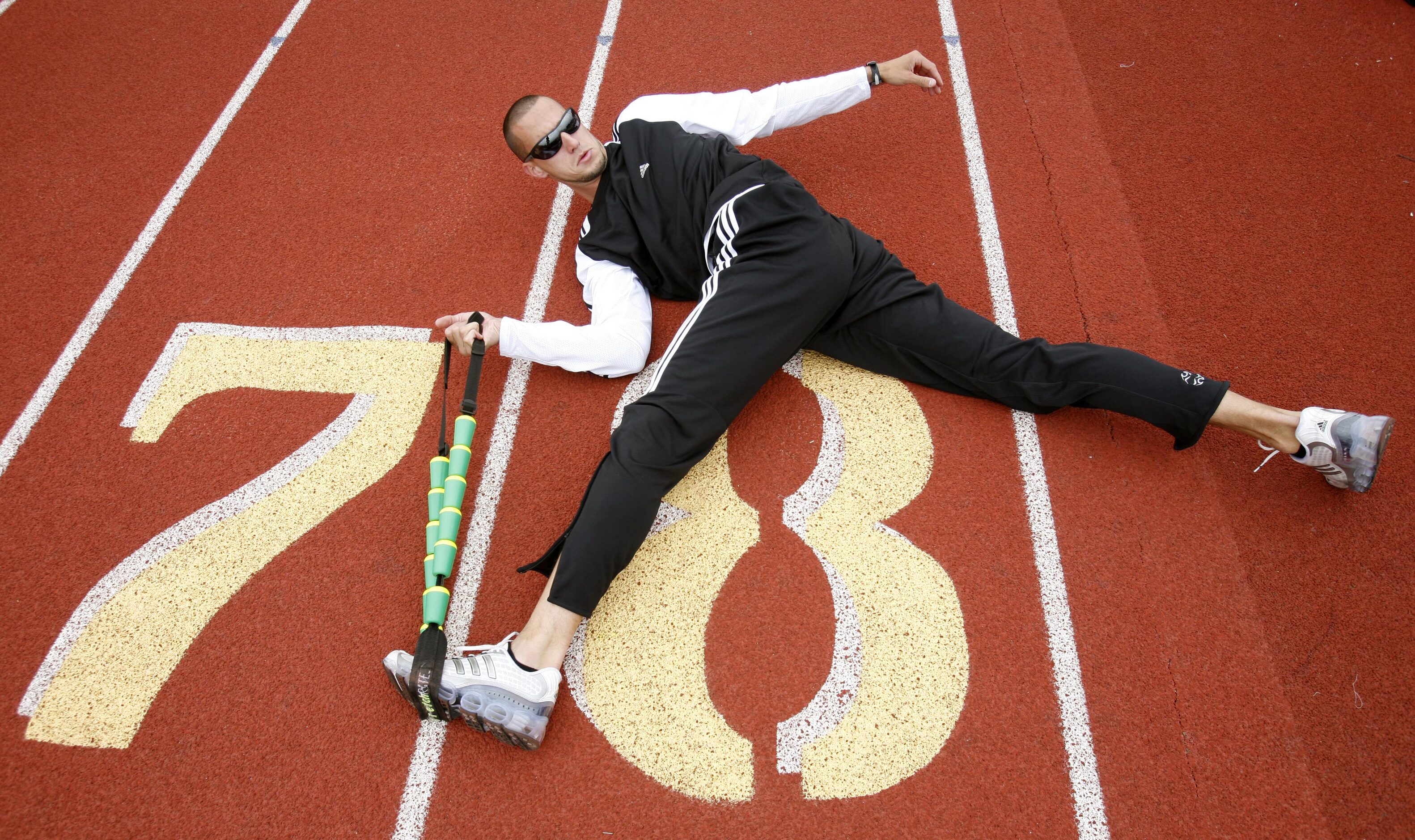 From 2007: Jeremy Wariner stretches before working out at the Baylor University...