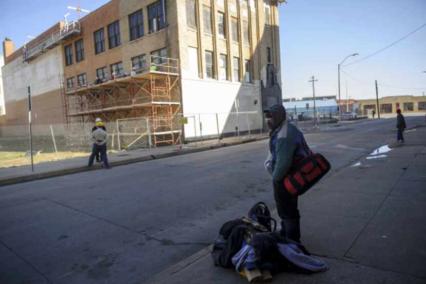 Tony Adams, who is homeless, waits outside First Presbyterian Church’s Stewpot in the...