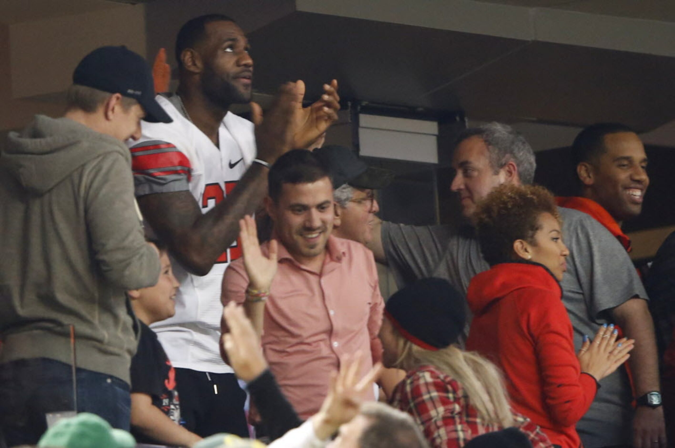 Cleveland Cavaliers LeBron James celebrates a touchdown from Ohio State Buckeyes in a game...