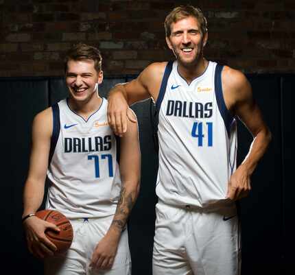 Dallas Mavericks Luka Doncic (left) and Dirk Nowitzki poses for a photo during Dallas...