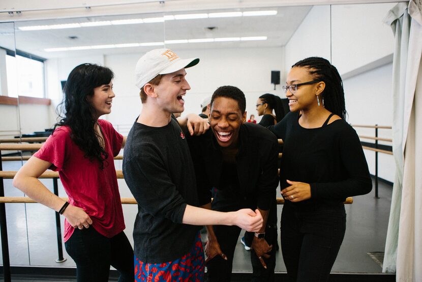 Booker T. Washington alumni Madison Hicks, 22, (left), Mason Manning, 22, (center left),...