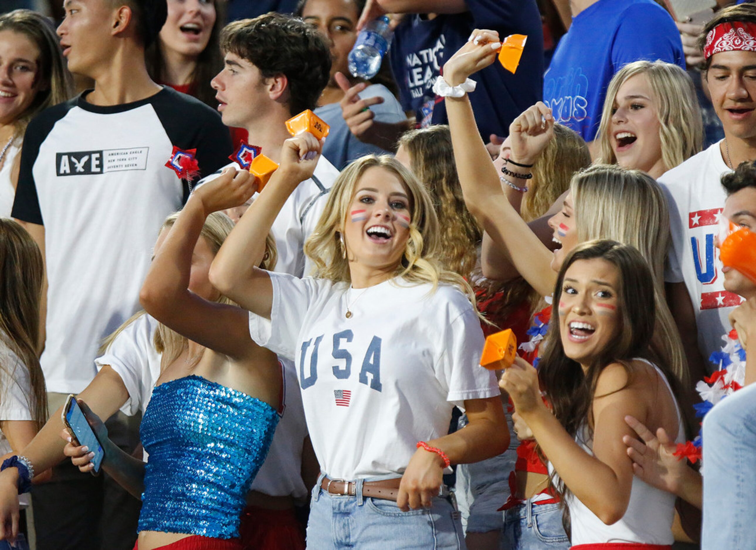 Wakeland High School students celebrate a touchdown during the first half as McKinney North...