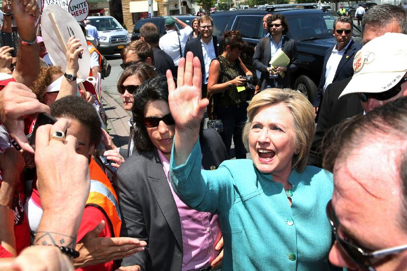 Democratic presidential candidate Hillary Clinton greets striking workers outside the Trump...