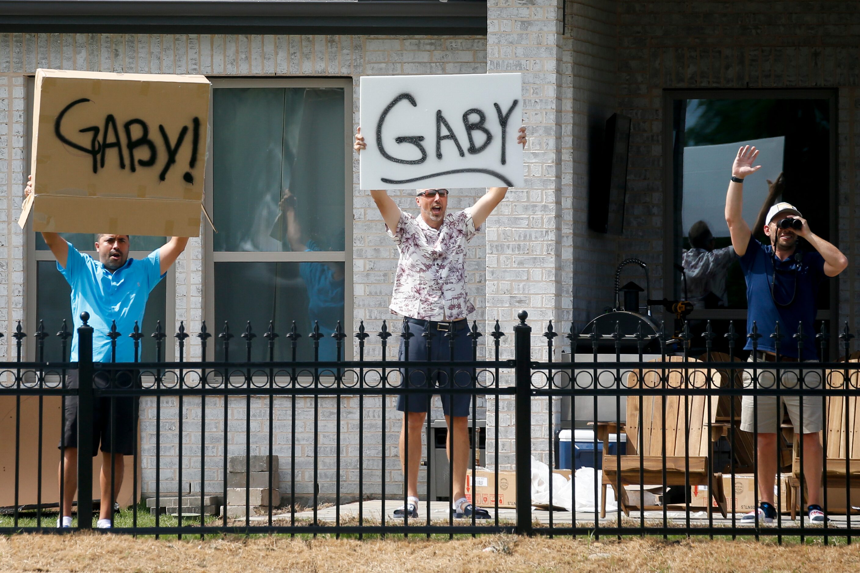 Fans cheer on professional golfer Gaby Lopez alongside the No. 2 green during the third...