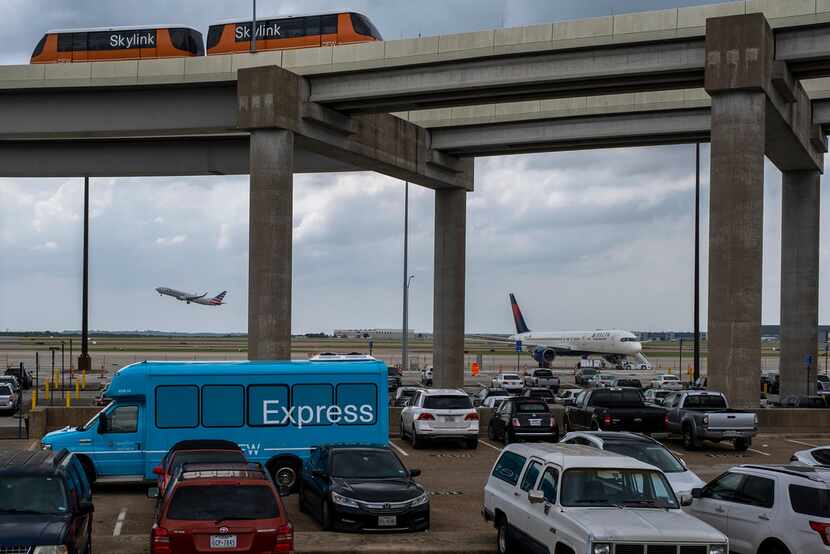 The Express South parking lot at DFW Airport is seen after it was announced that the...