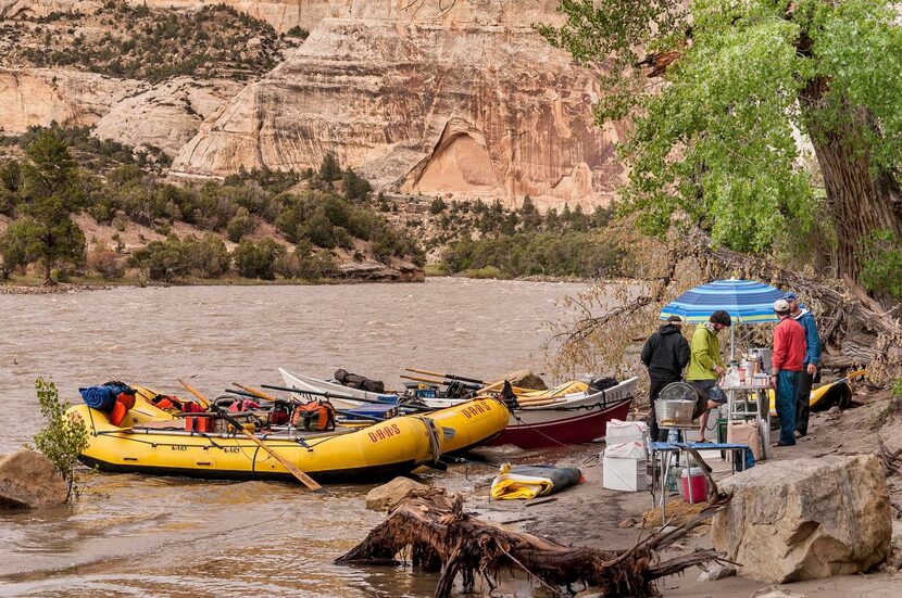 

Campers with O.A.R.S. chow down on entrees including salmon, chicken, steak and lasagna —...