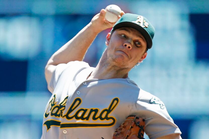 Oakland Athletics pitcher Sonny Gray throws against the Minnesota Twins in the first inning...