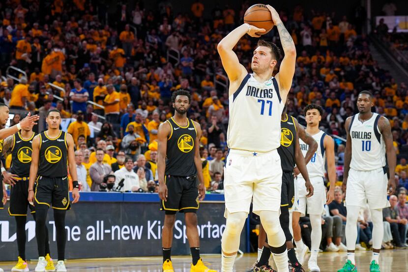 Dallas Mavericks guard Luka Doncic (77) misses a free throw after a technical foul against...