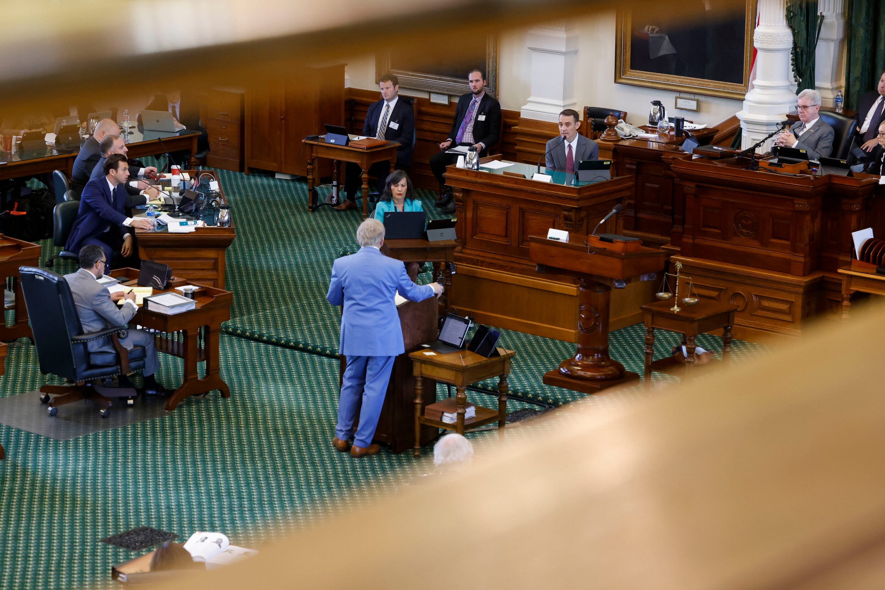 (From left) Anthony Osso, Jr., attorney for Texas Attorney General Ken Paxton, objects as...