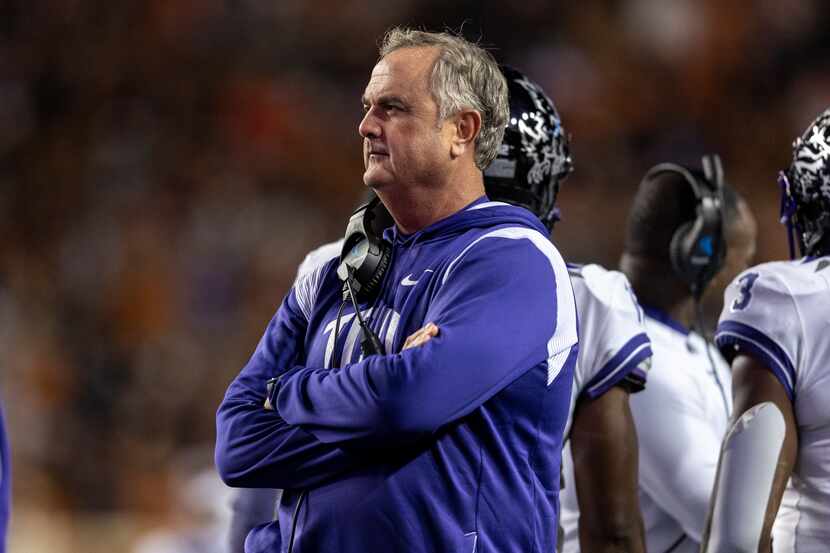 TCU coach Sonny Dykes watches the team play against Texas during the second half of an NCAA...